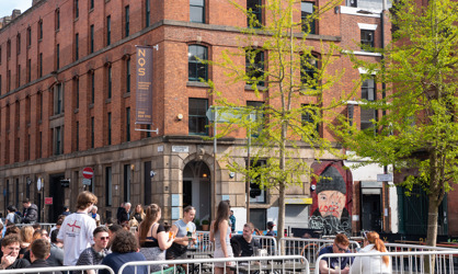 northern quarter stevenson square in summer with outside seating